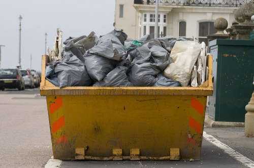 Worker wearing PPE conducting a site risk assessment