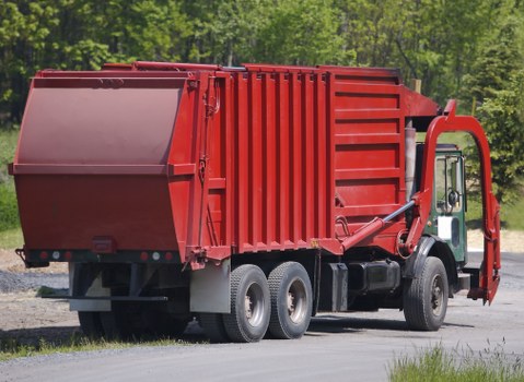 Person using a screen reader to access a business waste removal booking page